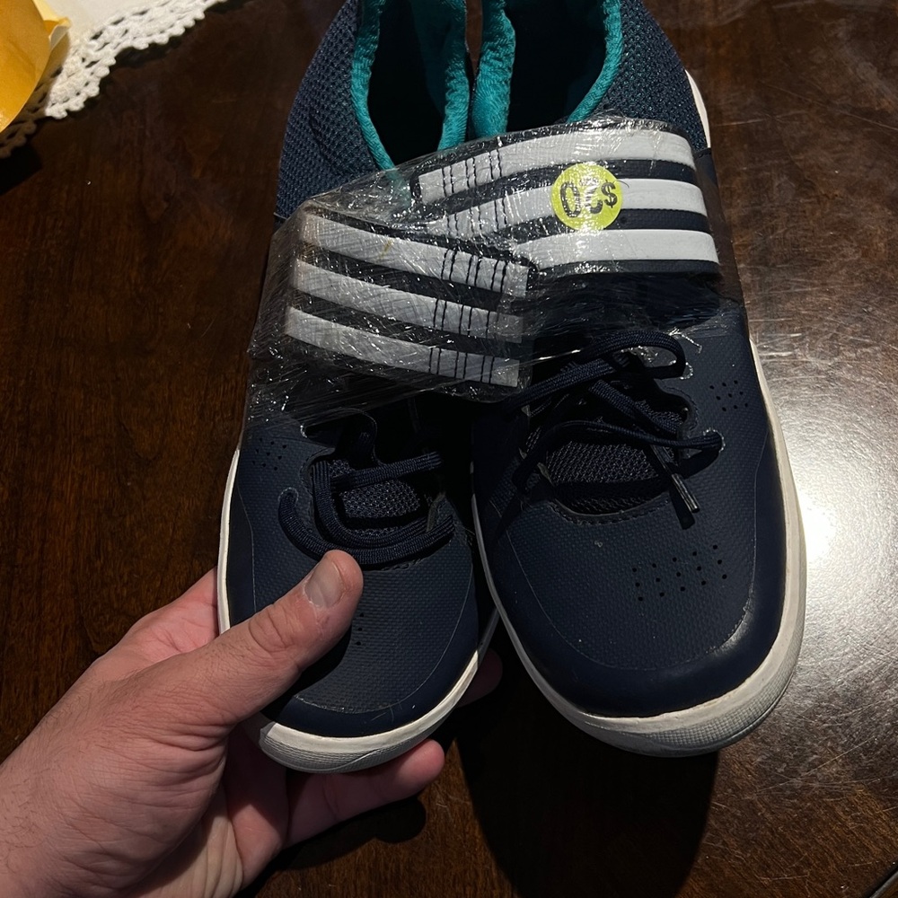 Navy and White Adidas Women’s Javelin Shoes